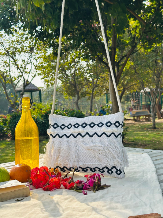 Handwoven Cotton Sling Bag – Ivory & Black Tribal Tassel Design